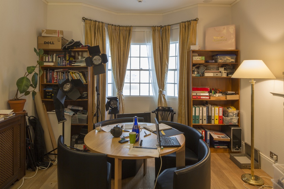 Delivery for Mr. Assange» - Julian Assangs's Room, Parcel on Bookshelf